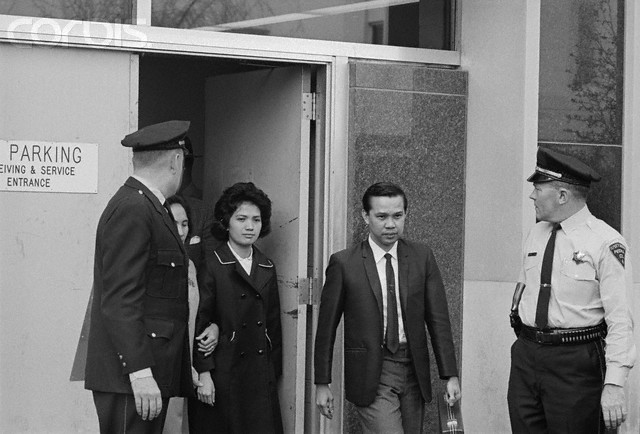 April 1967, Peoria, Illinois, USA --- The Lone Survivor. Peoria, Illinois: Corazon Amurao leaves the court here with her mother (partially hidden, second from left) after her cross examination in the trial of Richard Speck in April, 1967. Miss Amurao, 24, is the sole survivor in the brutal Chicago massacre of eight student nurses. Currently, the attractive Filipino has resumed her nursing activities in Manila and is running for councilor in her home town of San Luis, Batangas, south of Manila, in the upcoming November elections. Other is picture are unidentified. --- Image by © Bettmann/CORBIS